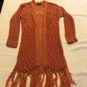 Girls peach open weave long sweater.